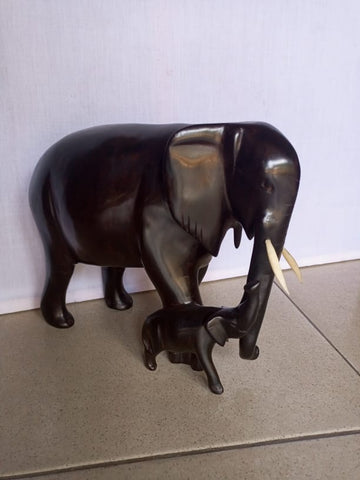 Elephant family. sculpture. mpingo wood sculpture. Tanzanian sculpture. Elephat sculpture.